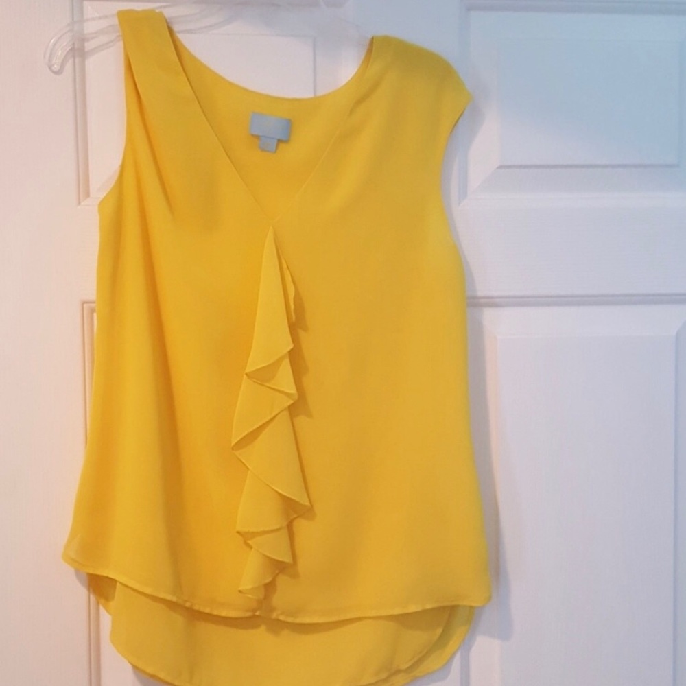 CeCe yellow ruffle top.